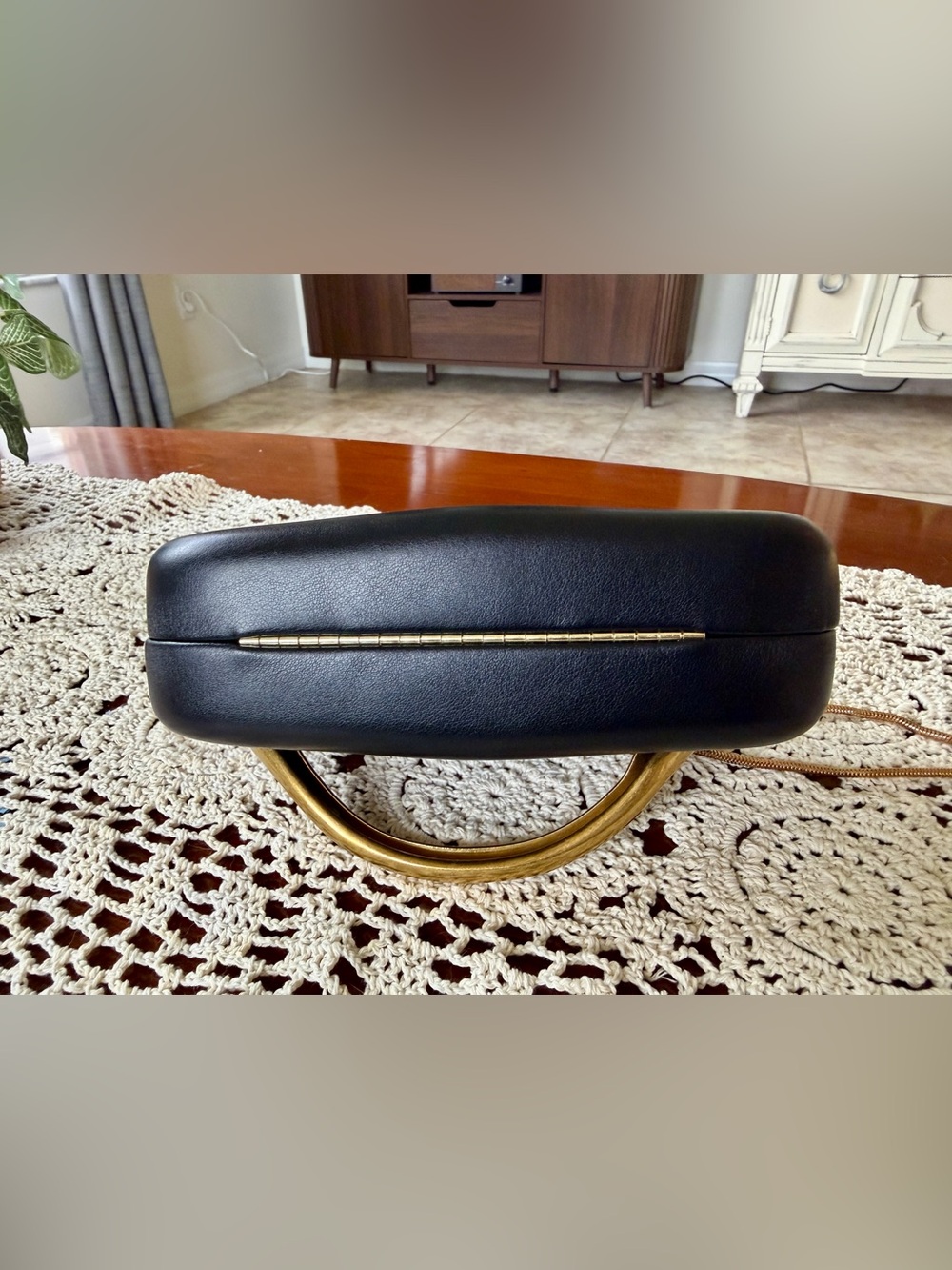 Black Leather Crossbody Clutch with Gold Accent - Picture 6 of 6